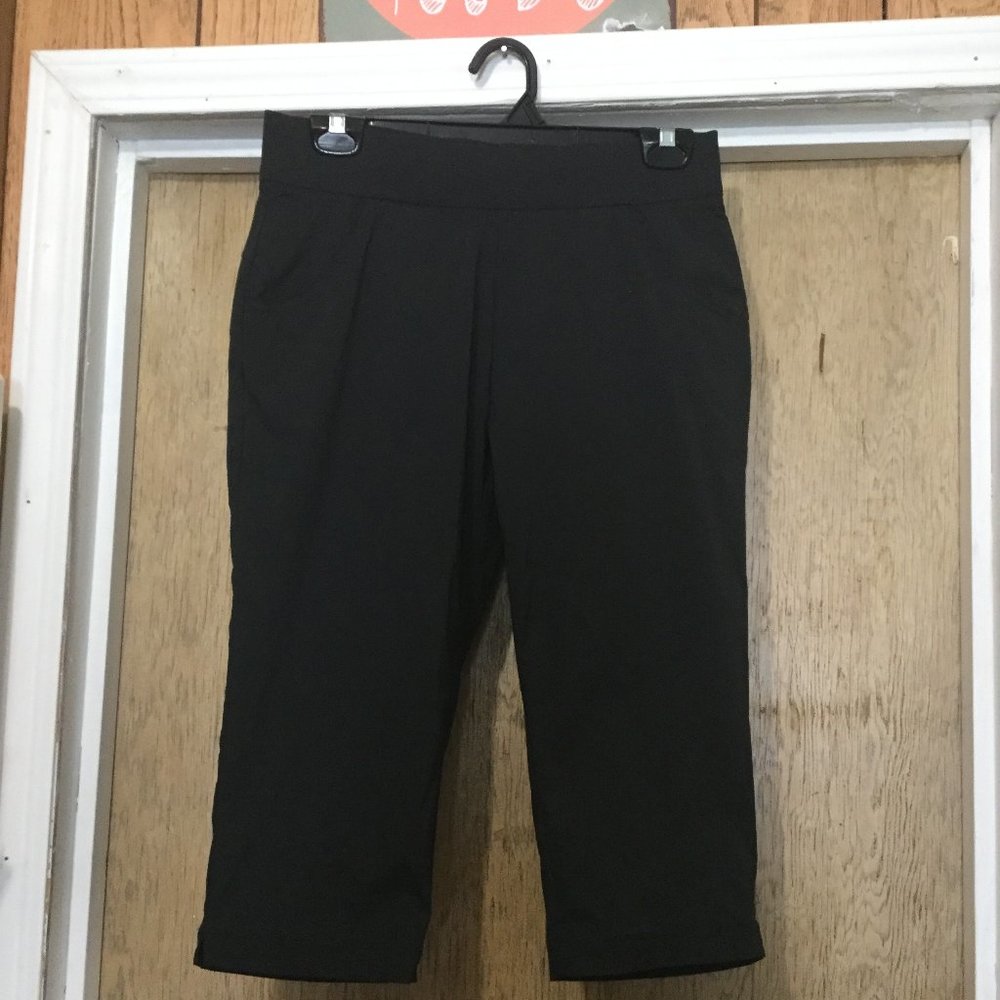 Columbia black longer length shorts size medium waist is 15" and inseam is 17.5"